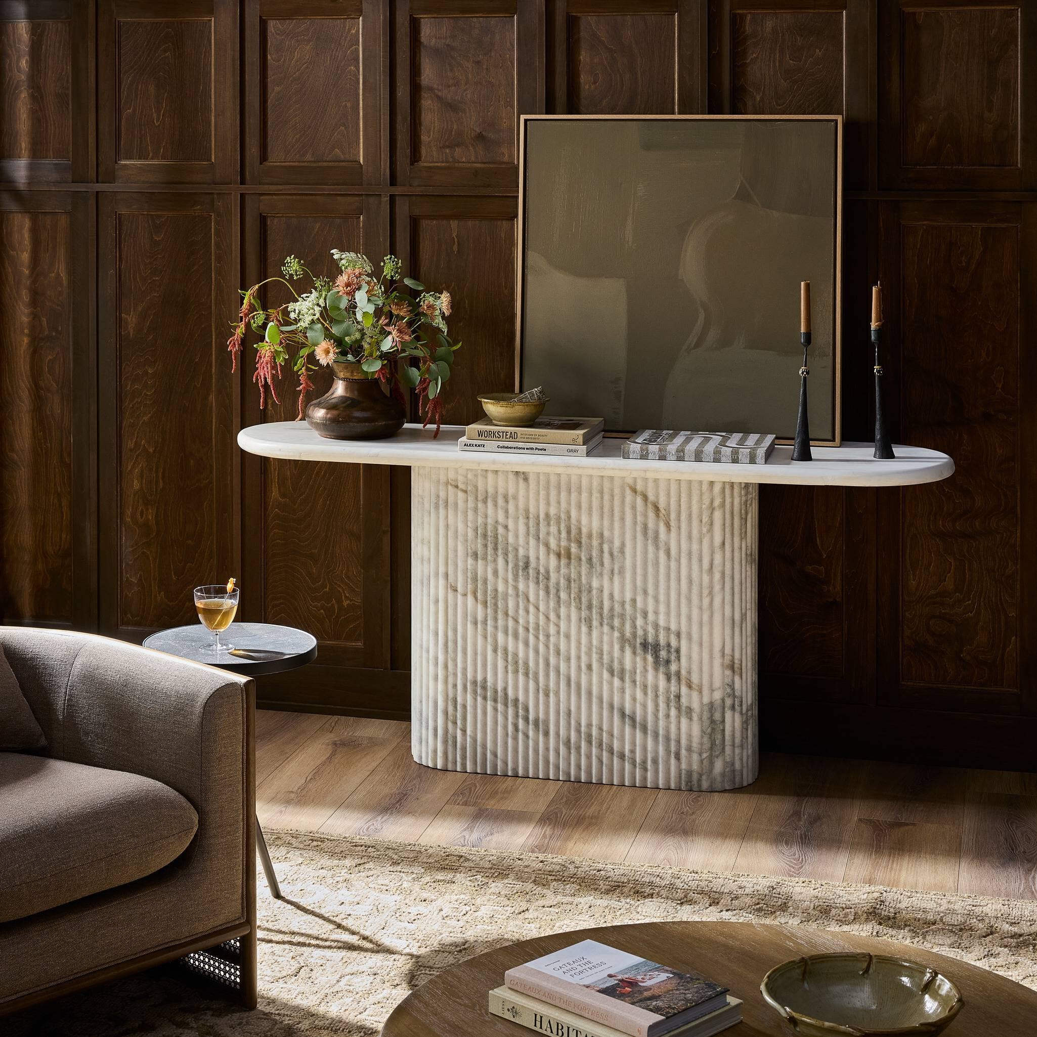 Oranda Console Table in Polished White Marble styled in an entryway