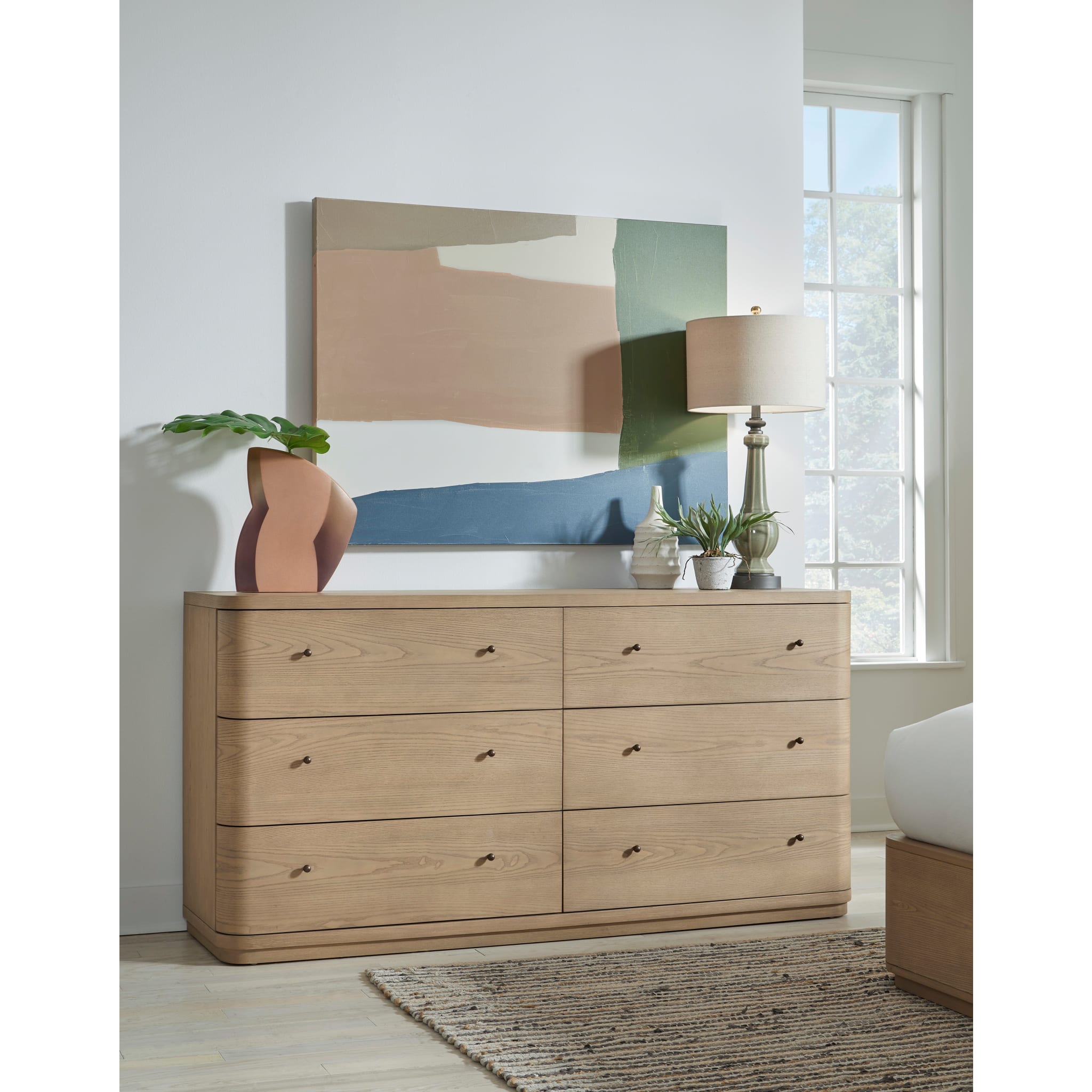 Penny 6-Drawer Dresser styled in a bedroom